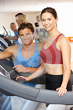 Woman Working With Personal Trainer