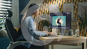 Woman working on photo in photoshop