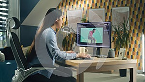 Woman working on photo in photoshop