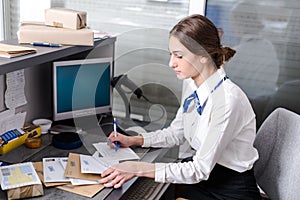 Woman working at the post office