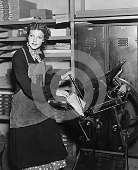 Woman working in print shop