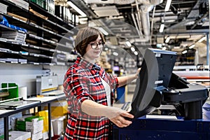 Woman working in a printing factory