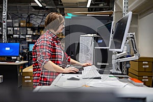 Woman working in a printing factory