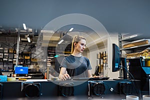 Woman working in a printing factory