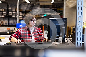 Woman working in a printing factory