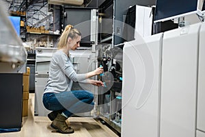 Woman working in a printing factory