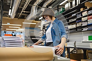 Woman working in a printing factory