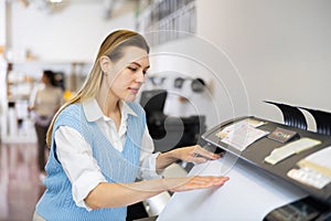 Woman working in publishing facility