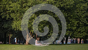 Woman Working Remotely In Park.