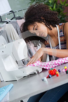 woman working with sewing machine