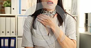 Woman at workplace on neck with chain with choking attack 4k movie