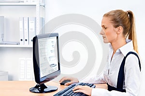 Woman works at the computer