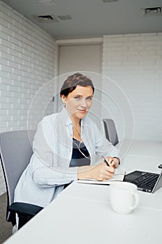 A woman works in a modern office