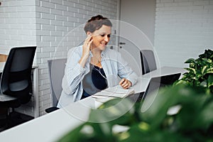 A woman works in a modern office