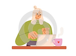 Woman works online at laptop. Business girl typing at notebook computer, at office desk with tea mug. Freelancers