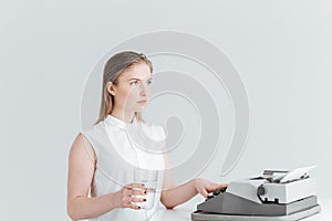 Woman worrking on retro print machine