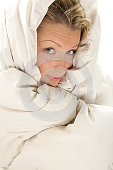 Woman wrapped duvet