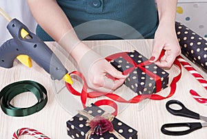 Woman wraps gift