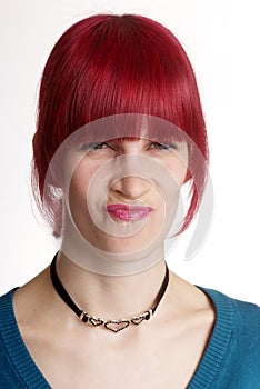 Woman wrinkling nose photo