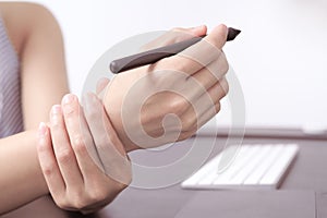 Woman wrist arm pain long use pen mouse working. office syndrome healthcare and medicine concept