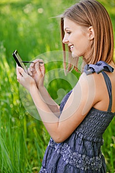 Woman writes in communicator photo