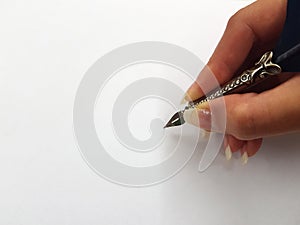 Woman writing with feather pen