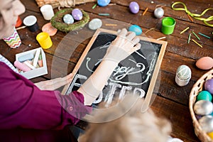 Woman Writing Happy Easter