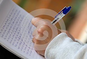 Woman writing her memoirs