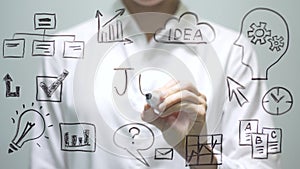 Woman writing JOB on transparent screen. Businesswoman write on board.