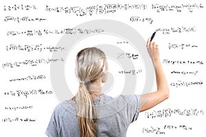 woman writing mathematical equations