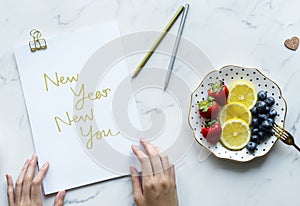 Woman writing New Year New You