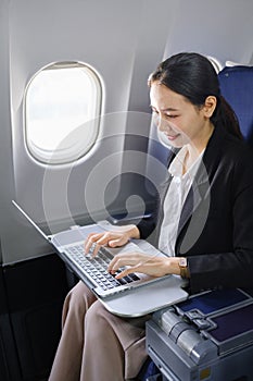 Woman Writing Notebook Plane Flying Concept