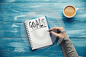 Woman written goals text