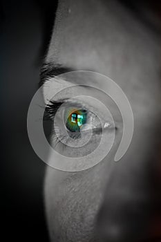 A woman's green eye closeup