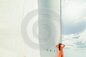 Woman yachting white sails luxury sailboat travel