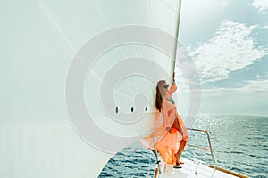 Woman yachting white sails luxury sailboat travel