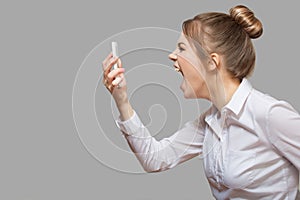 Woman yelling into the phone