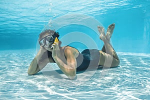 Woman yelling at phone in water