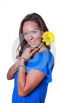 Woman with yellow flower