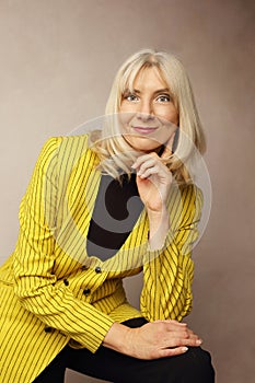 woman in yellow jacket branding photo