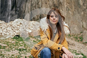 woman yellow jacket tourism mountains adventure landscape