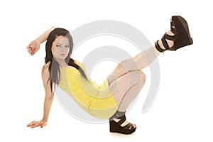 Woman yellow short dress down leg up