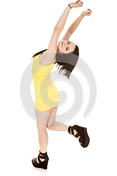 Woman yellow short dress stand hands up