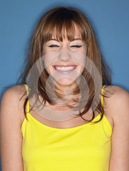 Woman In Yellow Tank Top Smiling