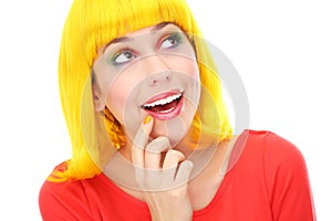 Woman with yellow wig looking up