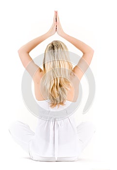 Woman in yoga lotus pose