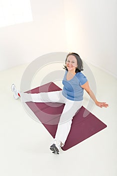 Woman on yoga mat