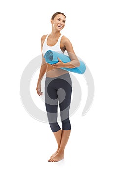 Woman, yoga mat and health fitness in studio for muscle flexibility, exercise or training. Female person, pilates and
