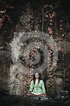 Woman in yoga meditation outdoor shot