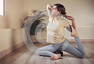 Woman, yoga or mermaids pose in house for health, wellness or body flexibility for practice routine. Girl, zen yogi or